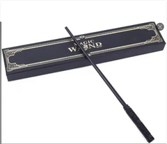 Black magic wand with textured grip, displayed with elegant gift box labeled 'Magic Wand'