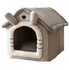 Cozy gray plush pet house with soft fleece lining and cute ear details, perfect for cats or small dogs