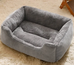 Cozy gray plush pet bed for cats and dogs, soft and comfortable for home use