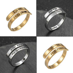 Inspirational quote rings with messages like 'I am enough' and 'keep going' — perfect family gifts