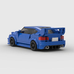 Blue LEGO-style sports car with rear spoiler, red taillights, and dual exhausts, perfect for kids and collectors.