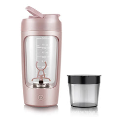 Pink portable electric blender with measurement markings and detachable cup for smoothies and shakes