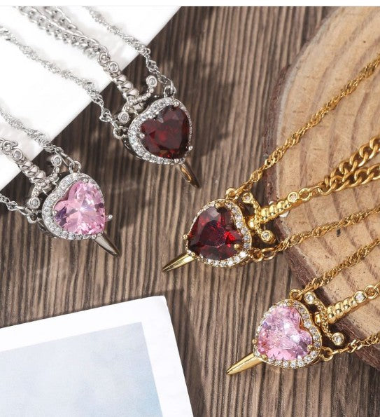 Heart-shaped gemstone necklaces in pink and red, gold and silver chains, perfect gift for her
