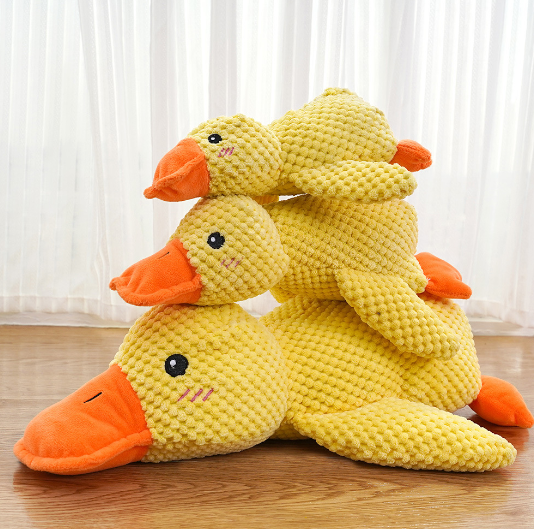 Cute yellow duck plush toys with orange beaks, perfect for kids and family gifts