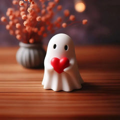 Cute white ghost figurine holding red heart, perfect for Halloween or Valentine's Day gifts