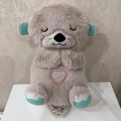 Soft gray otter plush toy with pink heart, teal paws, perfect for kids' gifts