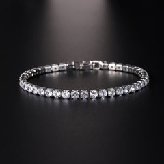 Elegant crystal tennis bracelet with sparkling stones on a sleek black background