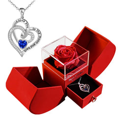 Heart-shaped necklace with blue gem and red rose in gift box, perfect romantic gift for loved ones