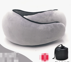Gray plush travel neck pillow with black mesh trim and carry bag, perfect for comfortable journeys
