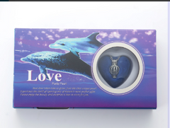 Dolphin-themed love gift box with heart pendant, perfect for family and loved ones