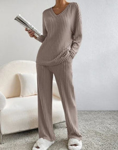 Cozy ribbed knit pajama set with V-neck top and wide-leg pants, perfect for lounging at home