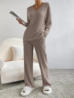 Cozy ribbed knit pajama set with V-neck top and wide-leg pants, perfect for lounging at home