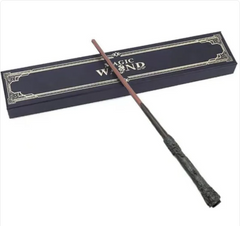 Magic wand with ornate handle, displayed beside elegant gift box for fantasy-themed gifts