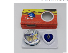 Heart-shaped blue pendant with angel charm, gift box labeled 'Love', perfect family gift set