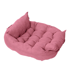 Pink plush pet bed with tufted cushion and cozy design for cats or small dogs