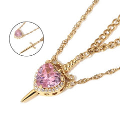 Heart-shaped pink gemstone pendant necklace with gold chain and diamond accents, perfect gift for her