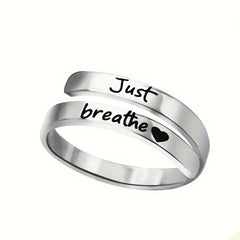 Silver ring with 'Just breathe' engraving and heart symbol, perfect gift for mindfulness and calm