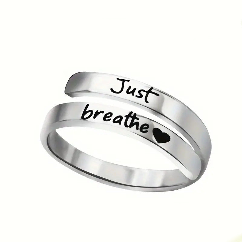 Silver ring with 'Just breathe' engraving and heart symbol, perfect gift for mindfulness and calm