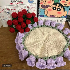 Handmade crochet flower coaster with red roses and purple blooms, perfect for home decor or gifting