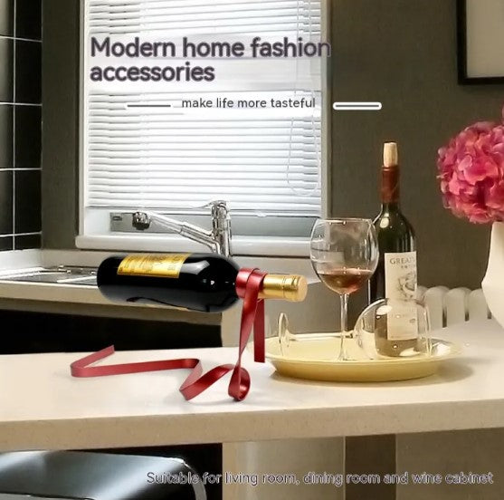 Modern wine bottle holder with red ribbon, glass, and tray for home decor or gifting