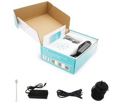 Compact air purifier kit with power adapter, USB cable, and cleaning tool in open box