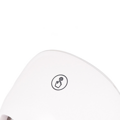 White touch-sensitive control icon on sleek device surface