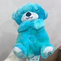 Soft blue otter plush toy with musical notes, perfect gift for kids and families