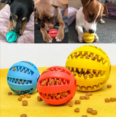 Colorful dog treat balls with teeth design for interactive play and feeding