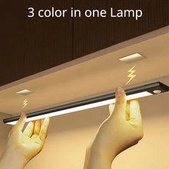 3-color LED under-cabinet lamp with touch control, hands installing light strip