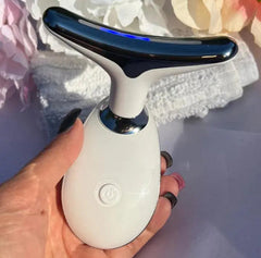 Handheld facial massager with blue LED light, ideal for skincare routines and relaxation gifts