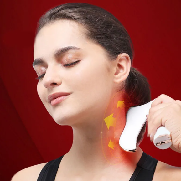 Woman using neck massager for relaxation and pain relief, glowing heat effect on shoulders