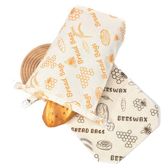 Beeswax bread bags with honeycomb and bee print, reusable food storage for eco-friendly kitchen use
