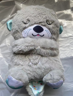 Cute gray otter plush toy with blue ears, perfect family gift