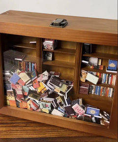 Wooden shadow box display filled with miniature books and collectible cards, perfect gift for book lovers