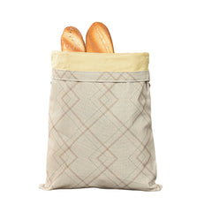 Reusable bread bag with diamond pattern holding two fresh baguettes, eco-friendly kitchen storage