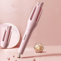 Pink automatic hair curler with sleek design, perfect for stylish curls at home